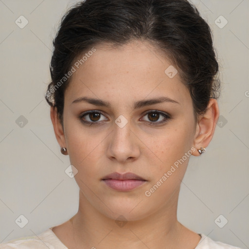 Neutral white young-adult female with short  brown hair and brown eyes