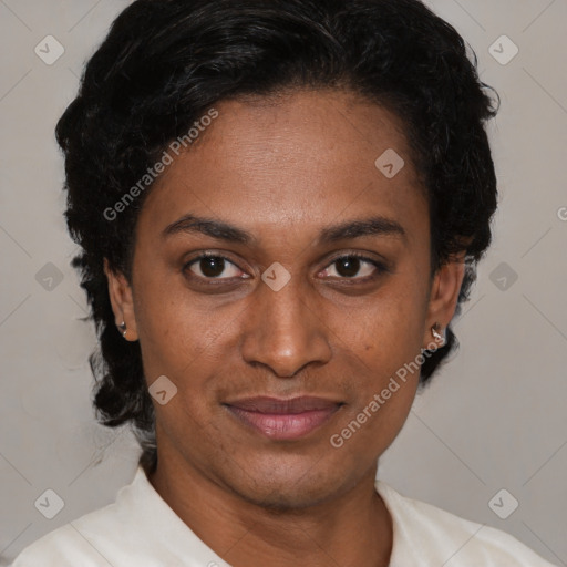 Joyful latino adult female with short  brown hair and brown eyes
