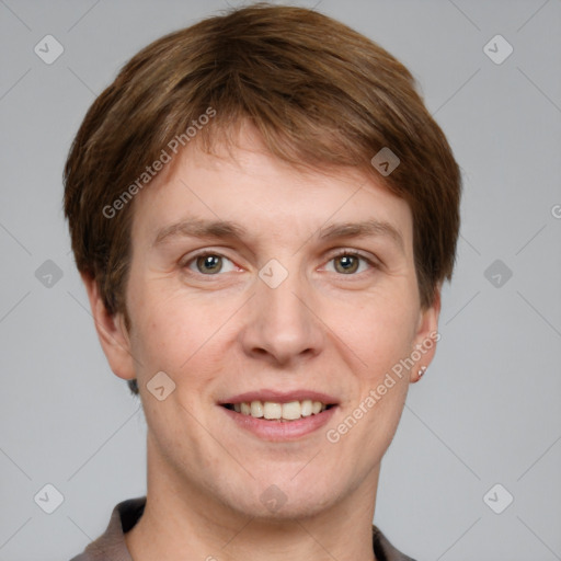 Joyful white young-adult female with short  brown hair and grey eyes