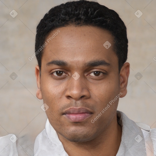 Neutral latino young-adult male with short  black hair and brown eyes