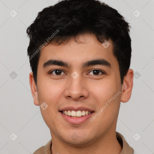 Joyful latino young-adult male with short  brown hair and brown eyes