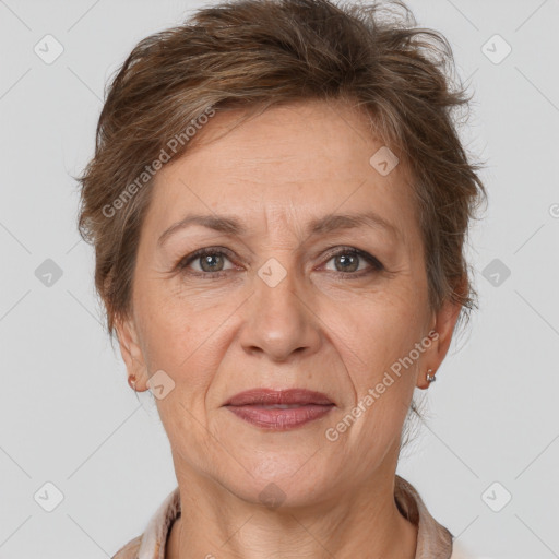 Joyful white adult female with short  brown hair and brown eyes