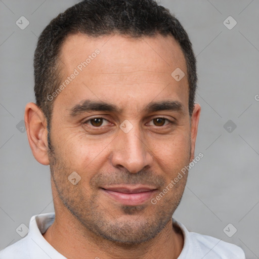 Joyful white adult male with short  brown hair and brown eyes