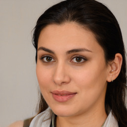 Joyful white young-adult female with medium  brown hair and brown eyes