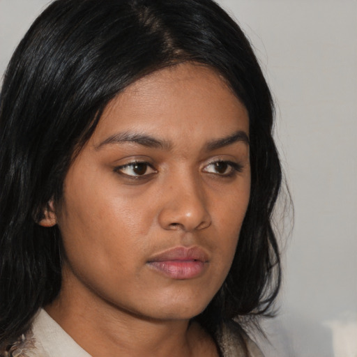 Neutral asian young-adult female with medium  brown hair and brown eyes