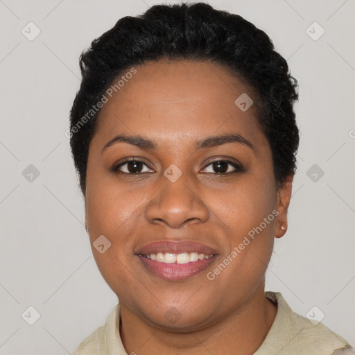 Joyful black young-adult female with short  black hair and brown eyes