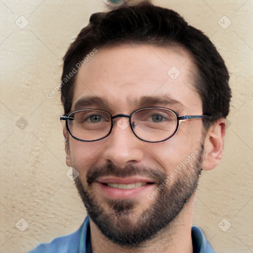 Joyful white young-adult male with short  black hair and brown eyes