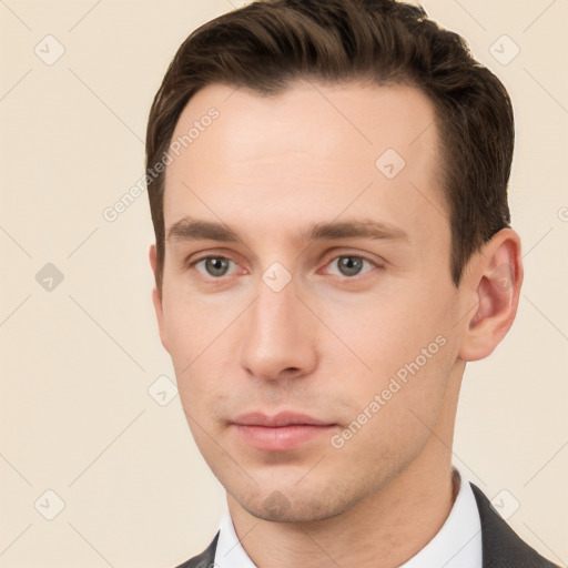 Neutral white young-adult male with short  brown hair and brown eyes