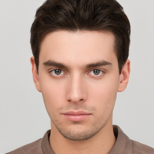 Neutral white young-adult male with short  brown hair and brown eyes