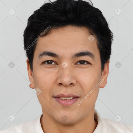 Joyful asian young-adult male with short  brown hair and brown eyes