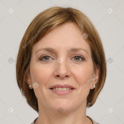 Joyful white adult female with medium  brown hair and grey eyes