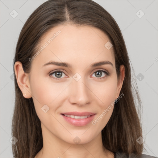 Joyful white young-adult female with long  brown hair and grey eyes