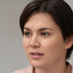 Neutral white young-adult female with medium  brown hair and brown eyes