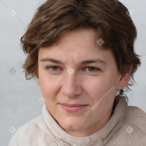 Joyful white young-adult female with medium  brown hair and blue eyes