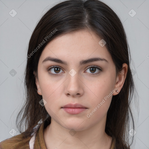 Neutral white young-adult female with long  brown hair and brown eyes