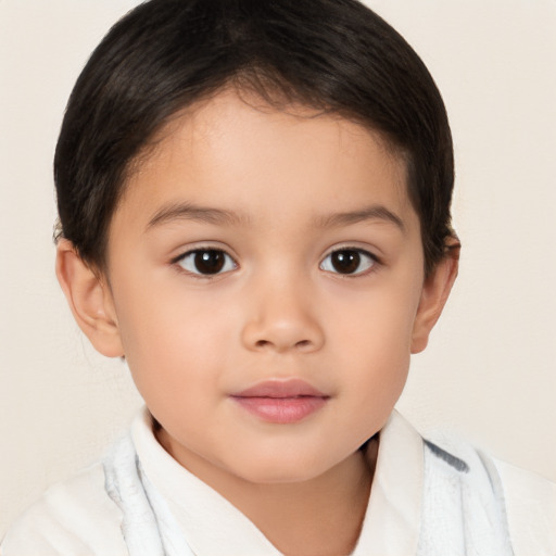 Joyful white child female with short  brown hair and brown eyes