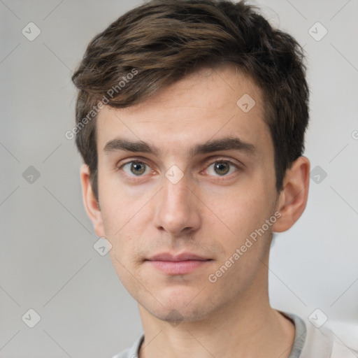 Neutral white young-adult male with short  brown hair and grey eyes