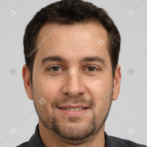 Joyful white adult male with short  brown hair and brown eyes