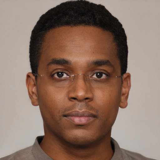 Neutral black young-adult male with short  black hair and brown eyes