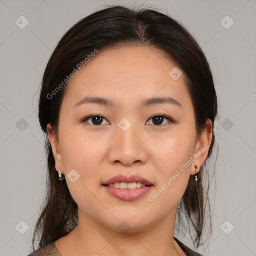 Joyful white young-adult female with medium  brown hair and brown eyes