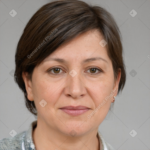 Joyful white adult female with medium  brown hair and grey eyes