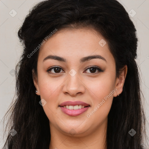 Joyful latino young-adult female with long  brown hair and brown eyes