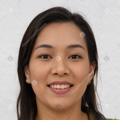 Joyful latino young-adult female with long  brown hair and brown eyes