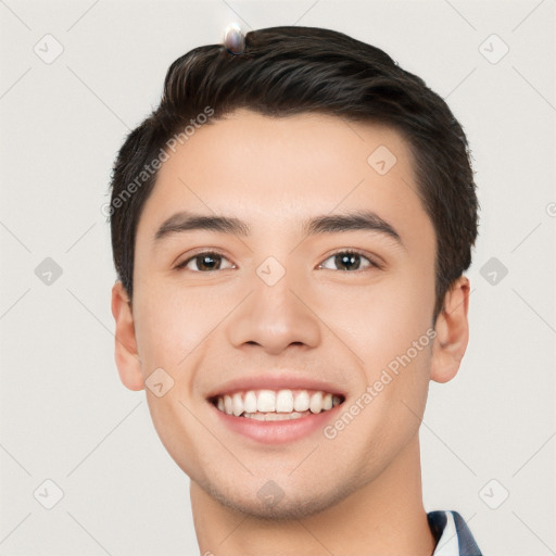 Joyful white young-adult male with short  black hair and brown eyes