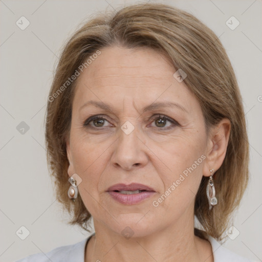 Joyful white adult female with medium  brown hair and grey eyes