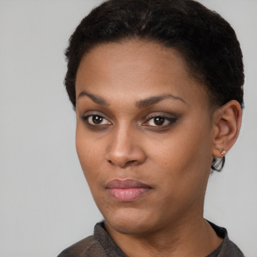Neutral latino young-adult female with short  black hair and brown eyes