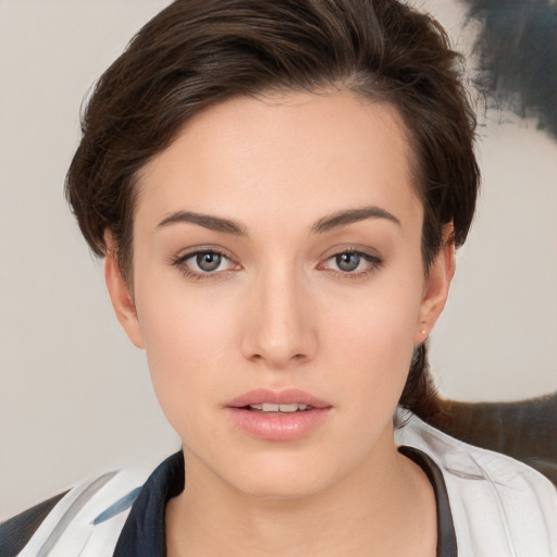 Neutral white young-adult female with short  brown hair and brown eyes