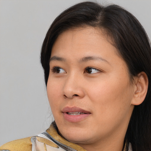 Neutral asian young-adult female with medium  brown hair and brown eyes