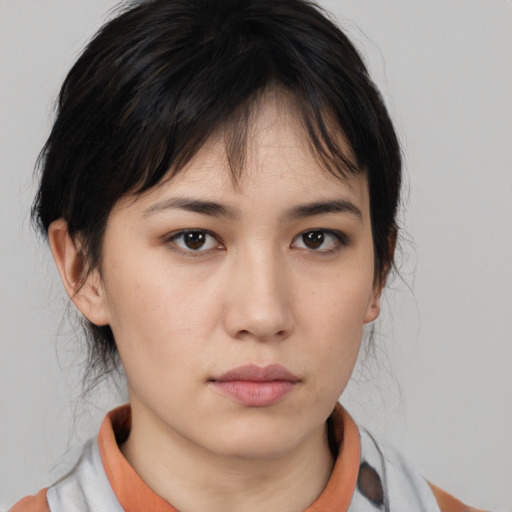 Neutral asian young-adult female with medium  brown hair and brown eyes