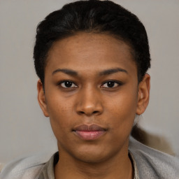 Neutral black young-adult female with short  black hair and brown eyes