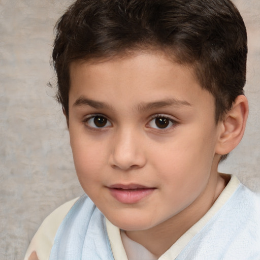 Joyful white child male with short  brown hair and brown eyes