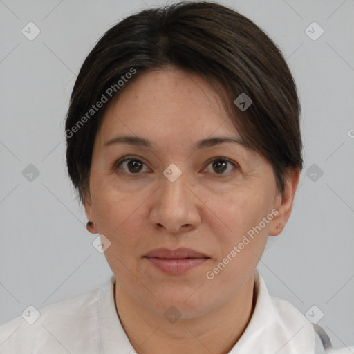 Joyful white adult female with short  brown hair and brown eyes