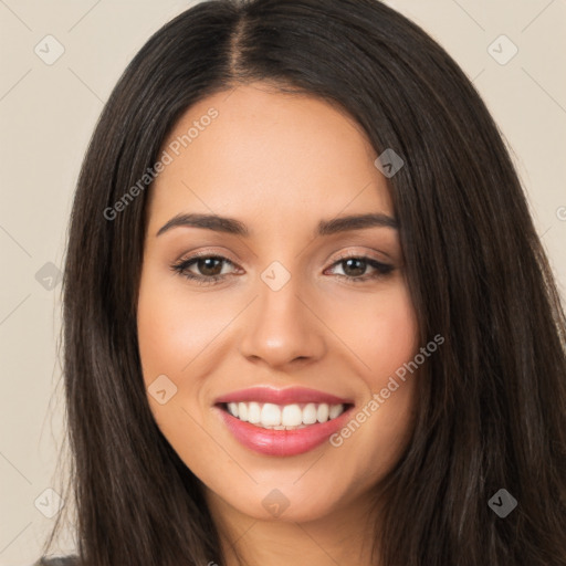 Joyful latino young-adult female with long  brown hair and brown eyes