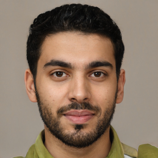Neutral latino young-adult male with short  black hair and brown eyes