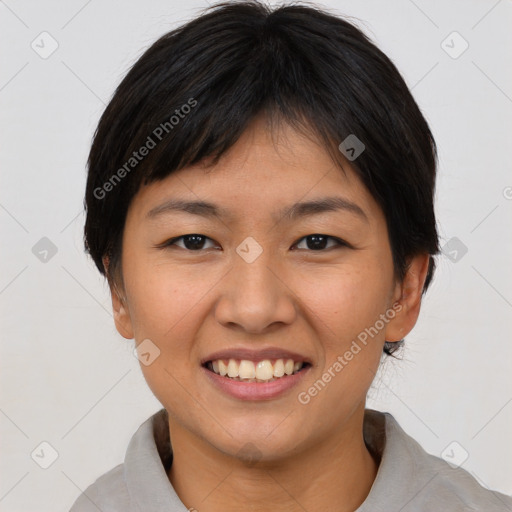 Joyful asian young-adult female with short  brown hair and brown eyes