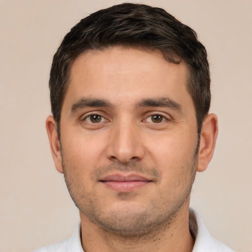 Neutral white young-adult male with short  black hair and brown eyes