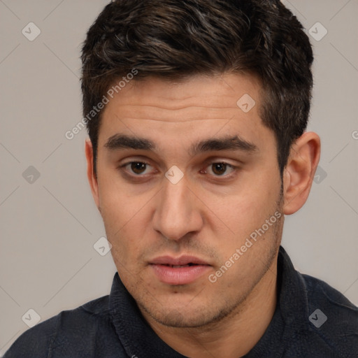 Neutral white young-adult male with short  brown hair and brown eyes