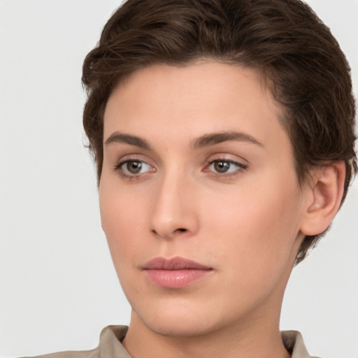 Neutral white young-adult female with short  brown hair and brown eyes