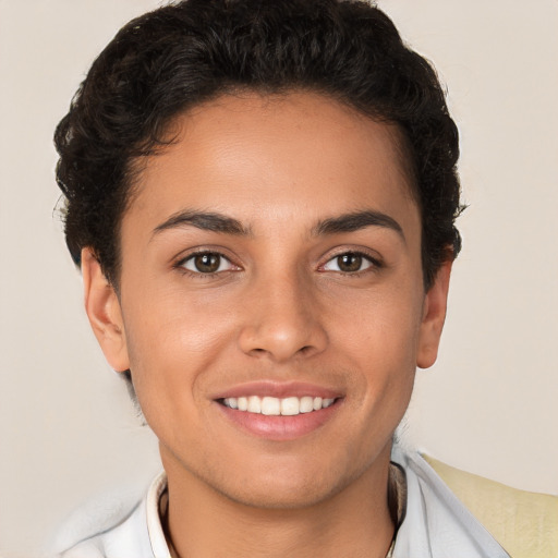 Joyful white young-adult female with short  brown hair and brown eyes