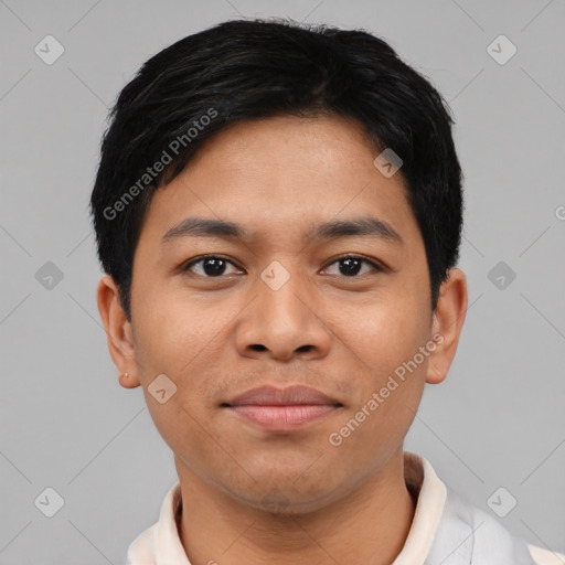 Joyful latino young-adult male with short  black hair and brown eyes