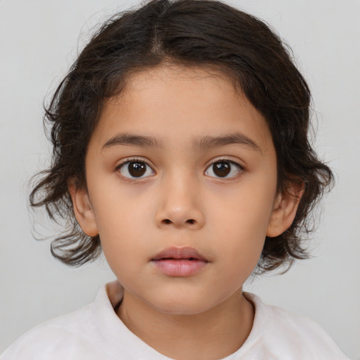 Neutral white child female with medium  brown hair and brown eyes