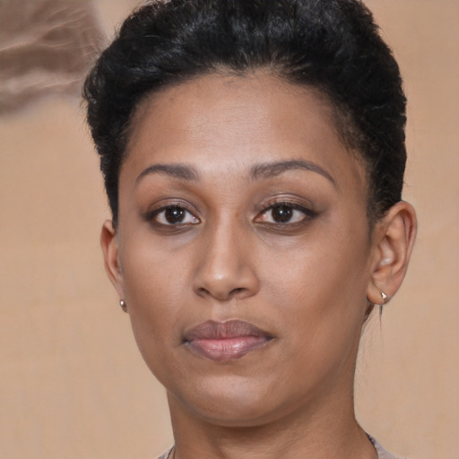 Neutral black young-adult female with short  brown hair and brown eyes
