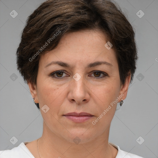 Joyful white adult female with short  brown hair and brown eyes