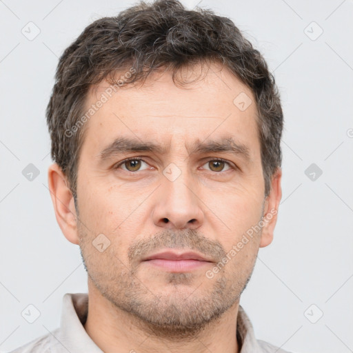 Neutral white adult male with short  brown hair and brown eyes