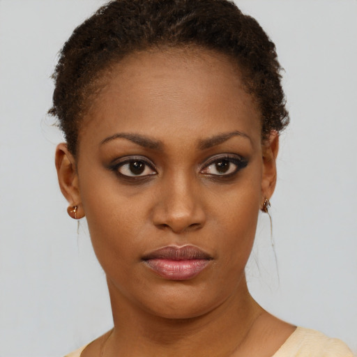 Neutral black young-adult female with short  brown hair and brown eyes