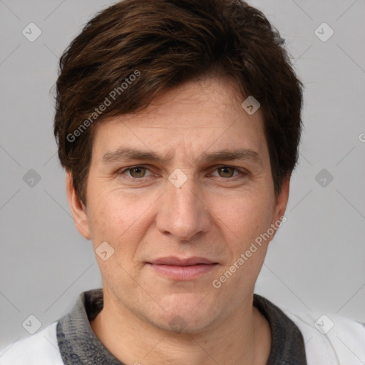 Joyful white adult male with short  brown hair and grey eyes